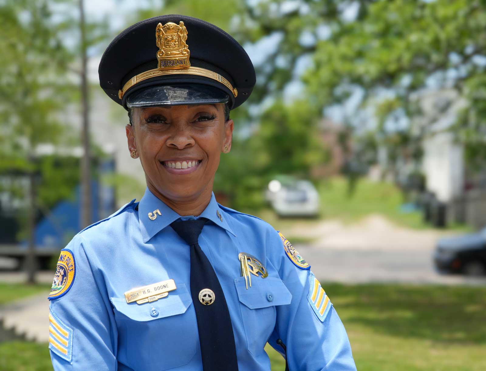 Part-time NOPD police officer facing forward