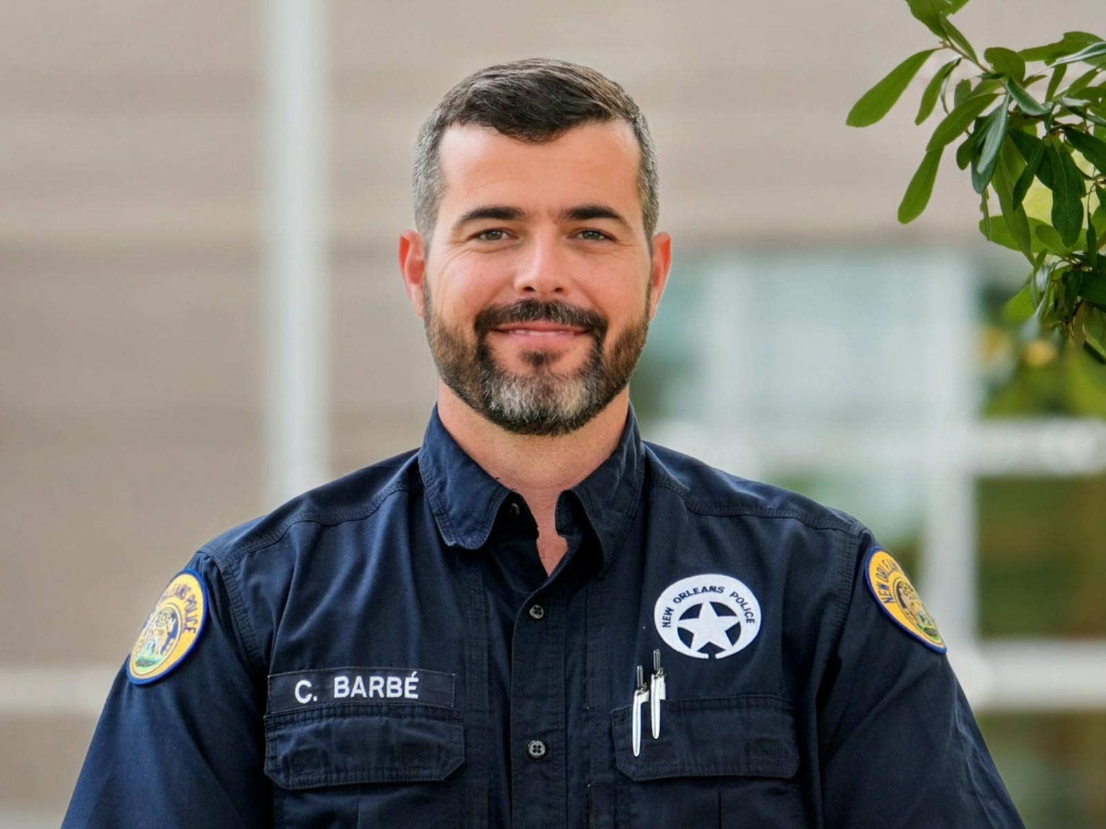 Part-time NOPD police officer facing forward